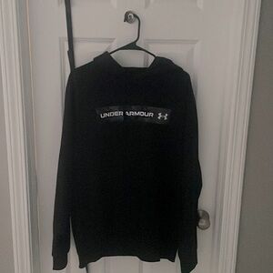 Black Under Armour sweatshirt.